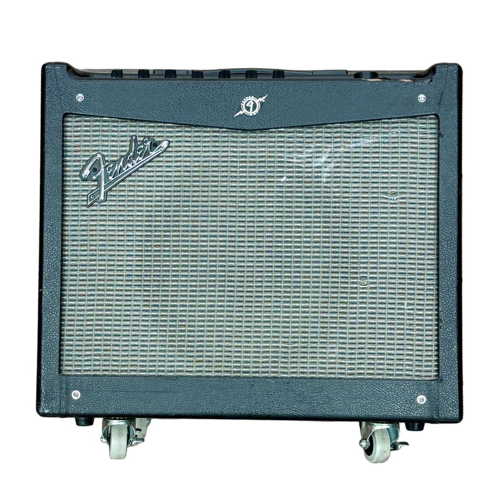 Fender MUSTANG III V.2 Modeling Guitar Combo Amplifier Fender guitar amplifier on a wooden floor with a person's feet visible