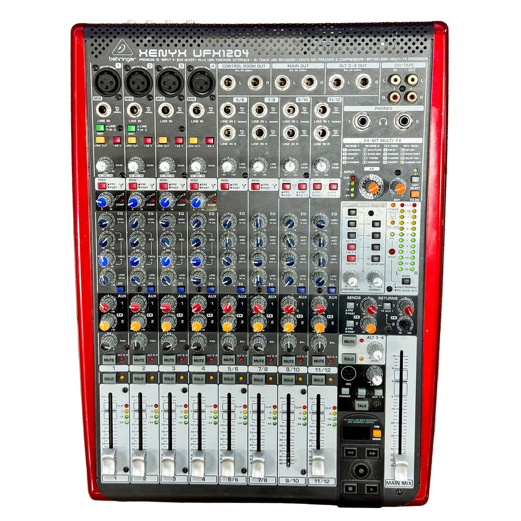 Behringer XENYX UFX1204 Mixer and USB Audio Interface with Effects Sound mixing console with red and black frame on a wooden surface
