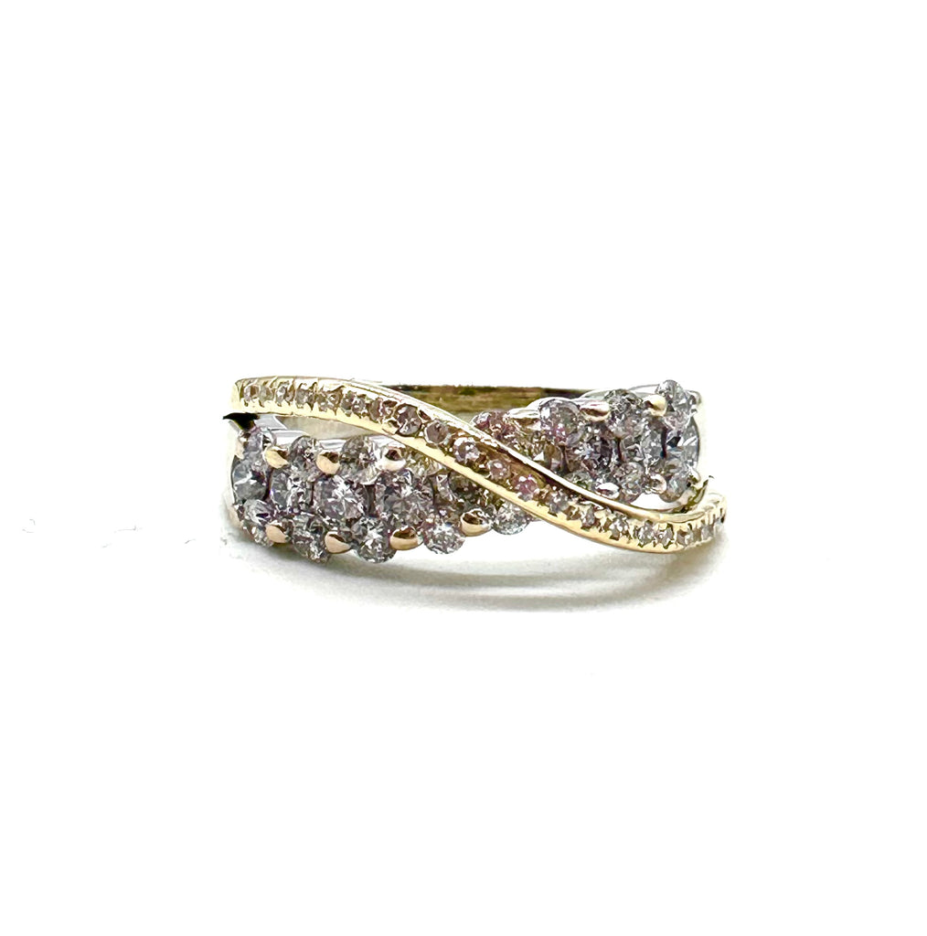 Gold and diamond ring on a white background