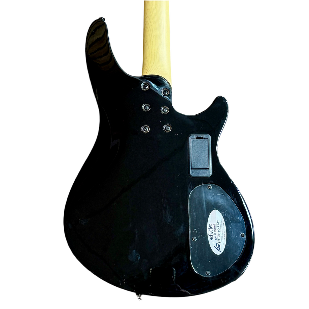 Schecter Diamond Series OMEN-4 Left-Handed Electric Bass Guitar Black electric guitar with a visible brand logo on a white background