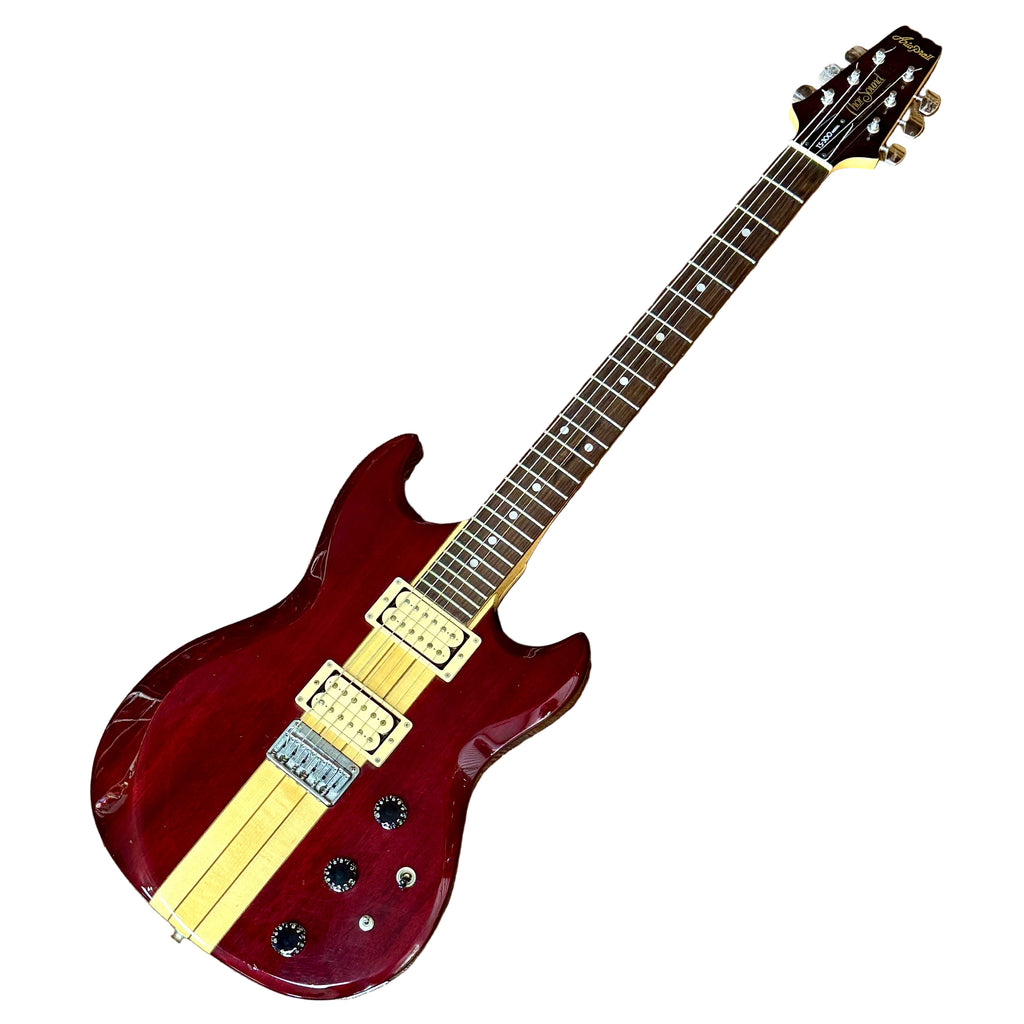Aria Pro II Thor Sound TS-300 Electric Guitar w/ Hard Case Guitar with a red body and white pickguard on a wooden floor