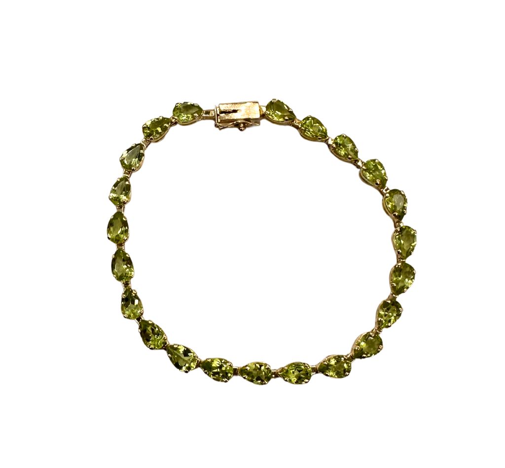 Green gemstone bracelet on a white background