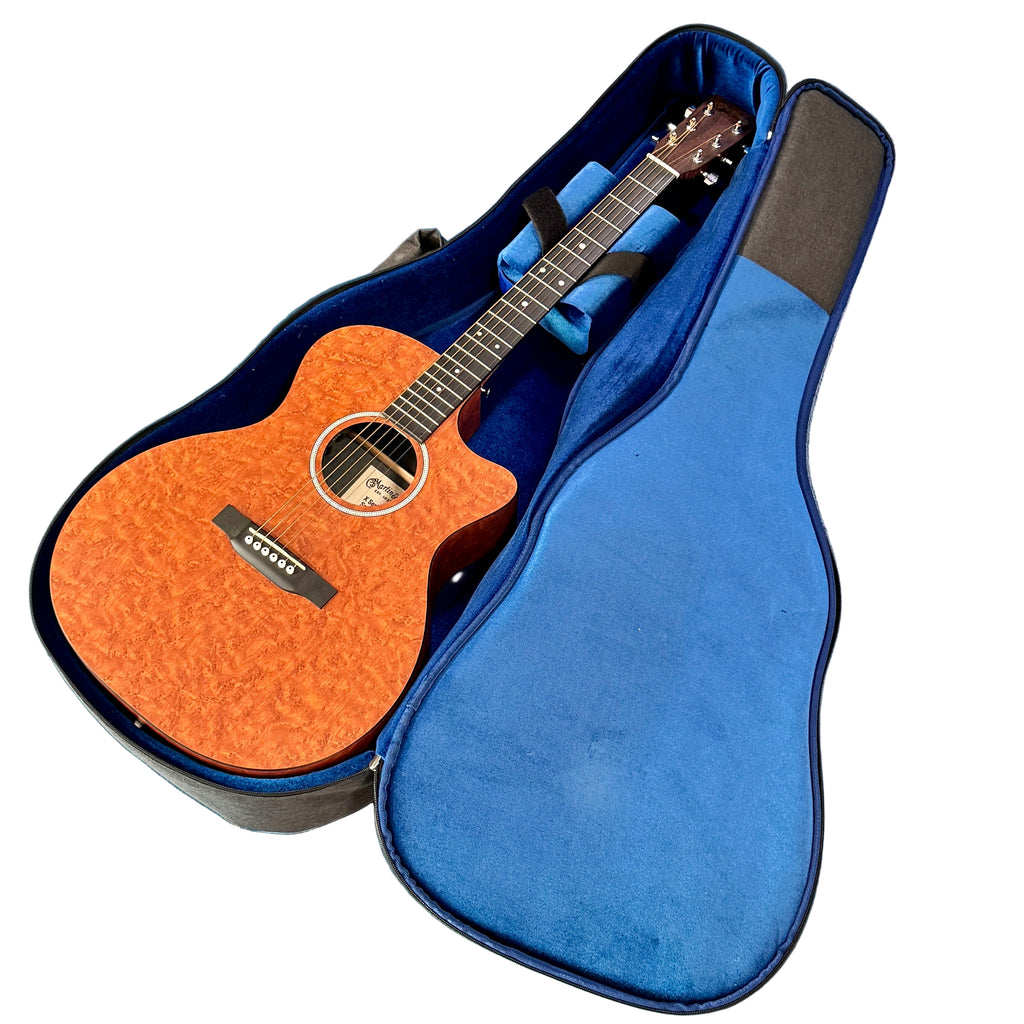 Martin X Series Special Acoustic-Electric Guitar w/ Soft Case Acoustic guitar in a blue case on a blue surface
