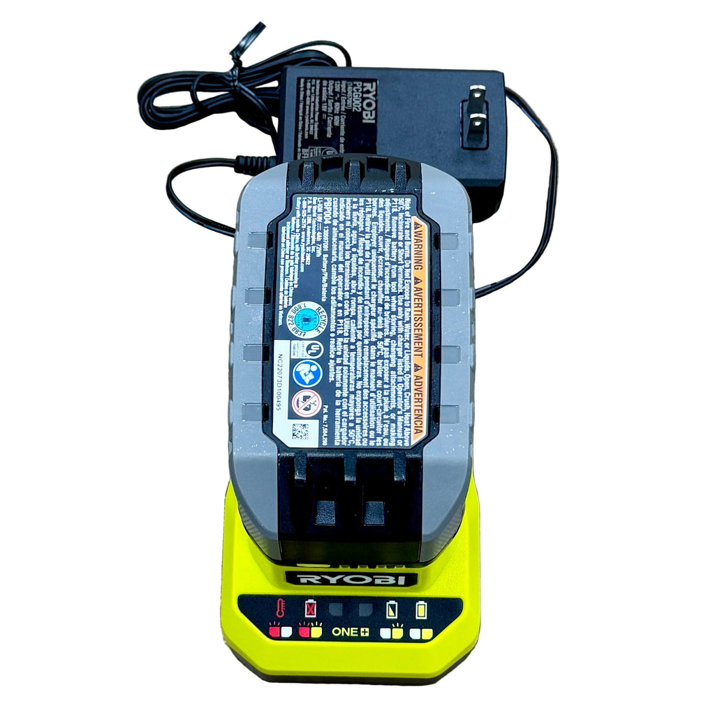RYOBI ONE+ HP 18V 1/2" Brushless Cordless Hammer Drill w/ Battery, Charger, & Bag (PBLHM101) Ryobi battery pack on a charger with visible branding on a wooden surface