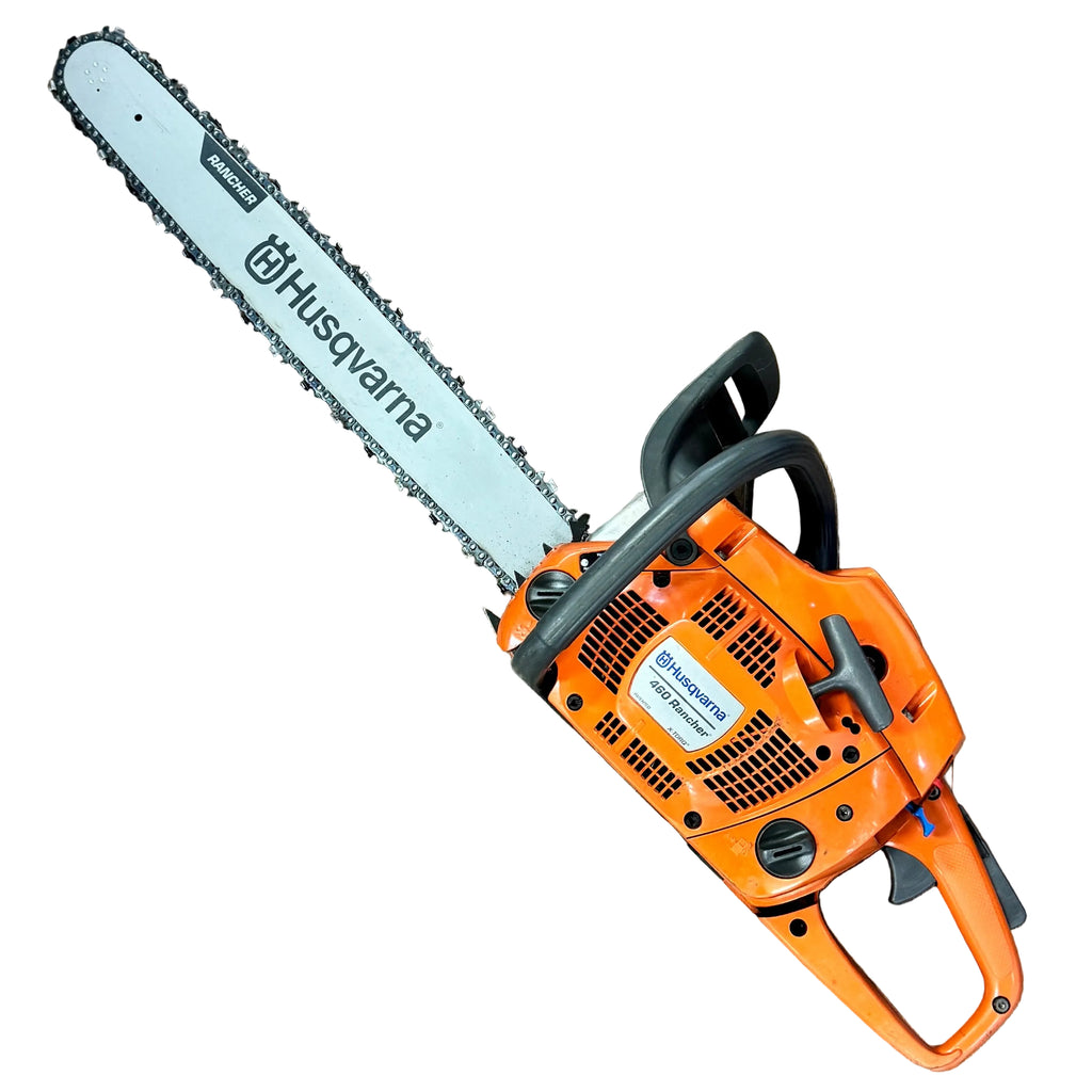 Husqvarna 460 Rancher 60cc 24" Guide Bar Gas-Powered Chainsaw Husqvarna chainsaw on a wooden floor