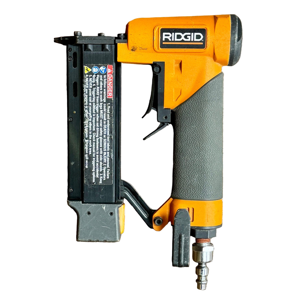 RIDGID 23-Gauge 1-3/8" Pneumatic Headless Pin Nailer (R138HPA) Orange and gray RIDGID nail gun on a white background