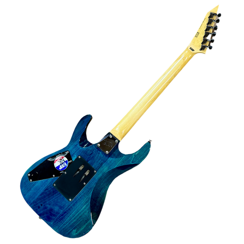ESP LTD MH-100QM Electric Guitar Blue electric guitar with a white background