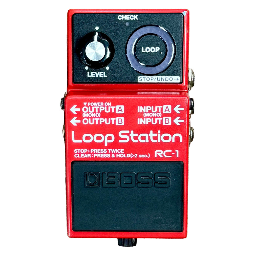 BOSS RC-1 Loop Station Guitar Effects Pedal Red Loop Station RC-1 guitar effects pedal by Boss on a white background