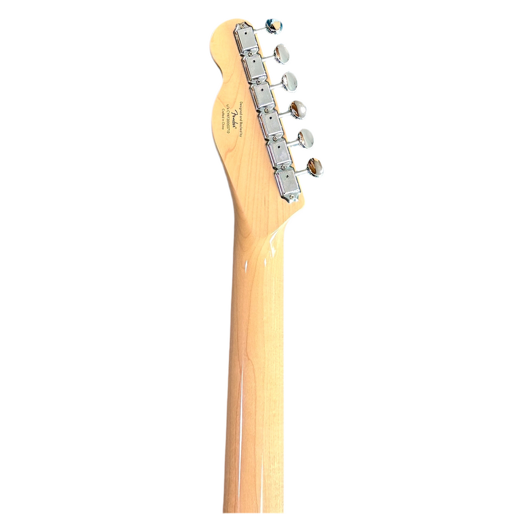 Fender Squier Jaguar Electric Guitar Close-up of a guitar headstock with tuning pegs on a white background