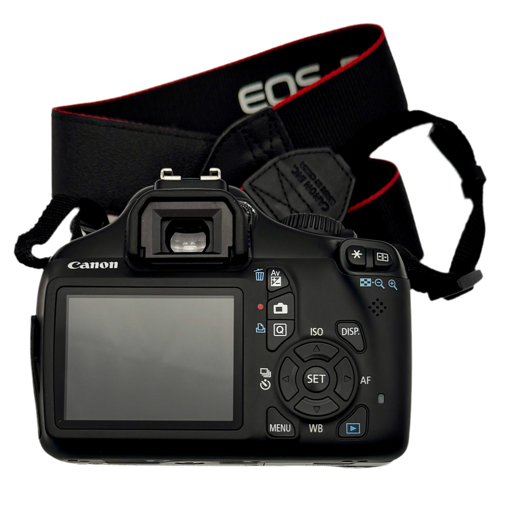 Canon EOS Rebel T3 12.2 MP CMOS Digital SLR Camera w/ Canon Zoom Lens EF-S 18-55mm f/3.5-5.6 IS II & Canon Zoom Lens EF 75-300mm f/4-5.6 III Lenses Canon camera with strap on a white background