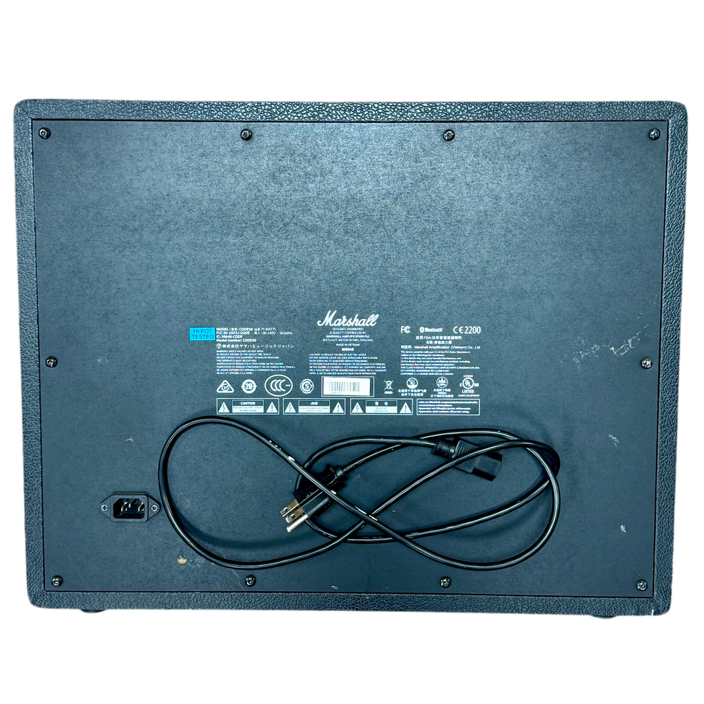 Marshall CODE 50 Guitar Combo Amplifier Back view of a Marshall amplifier with a cable plugged in on a white background