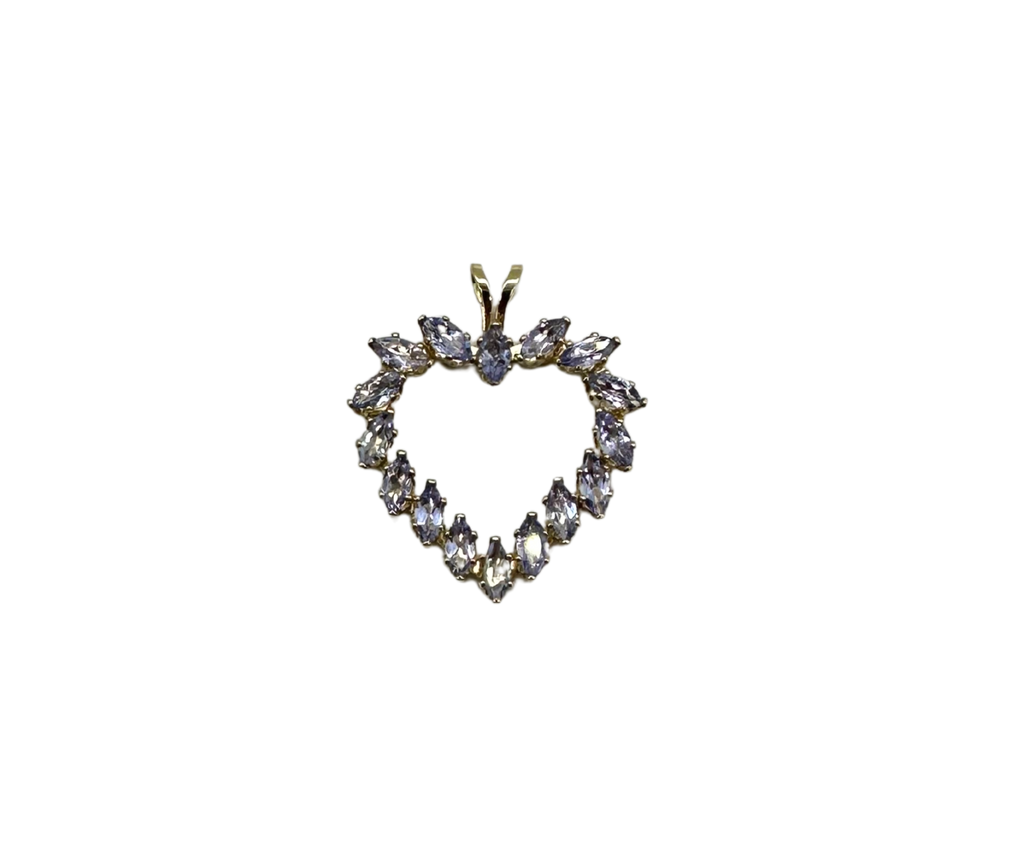 Heart-shaped diamond pendant on a clear background