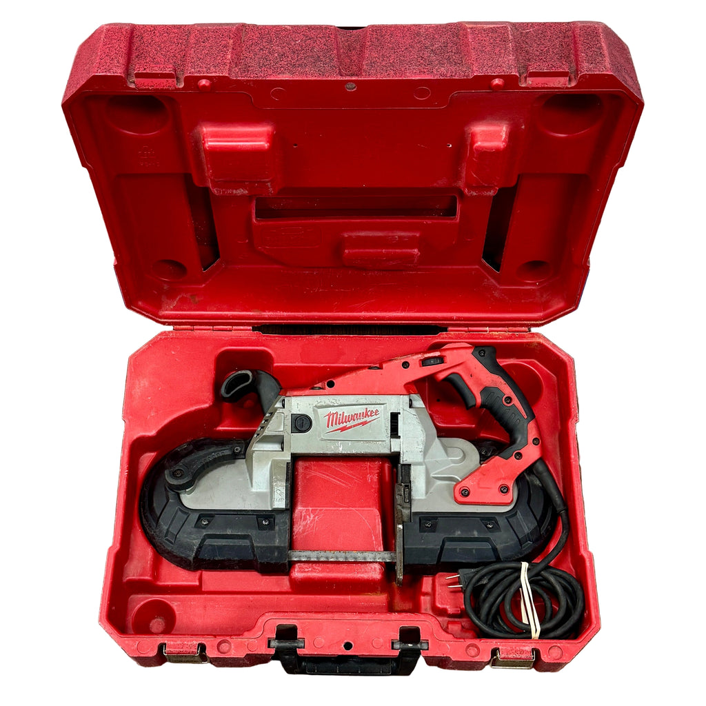 Milwaukee 11-Amp Corded Variable Speed Deep Cut Band Saw w/ Hard Case (6232-20) Milwaukee power tool in a red case on a wooden floor.
