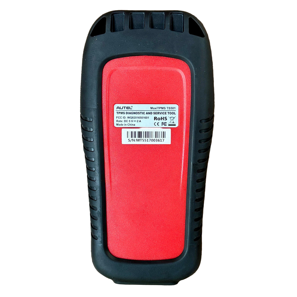 AUTEL MaxiTPMS TS501 Vehicle Diagnostic Code Scanner Tool w/ Hard Case Red and black diagnostic tool on a wooden surface