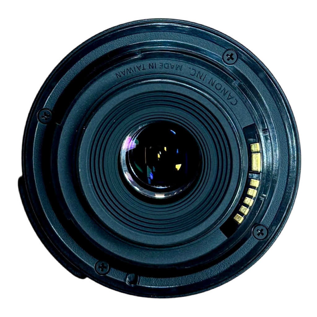 Canon EOS REBEL T3 12.2 MP CMOS Digital SLR Camera w/ Canon Zoom Lens EF-S 18-55mm f/3.5-5.6 IS II Lens & Case Close-up of a Canon camera lens on a white background