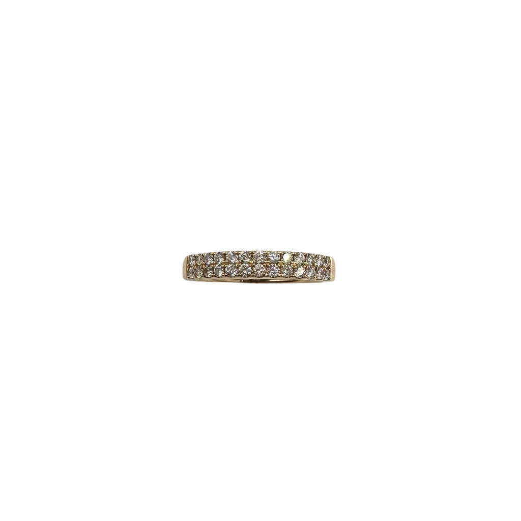 Gold ring with diamonds on a white background