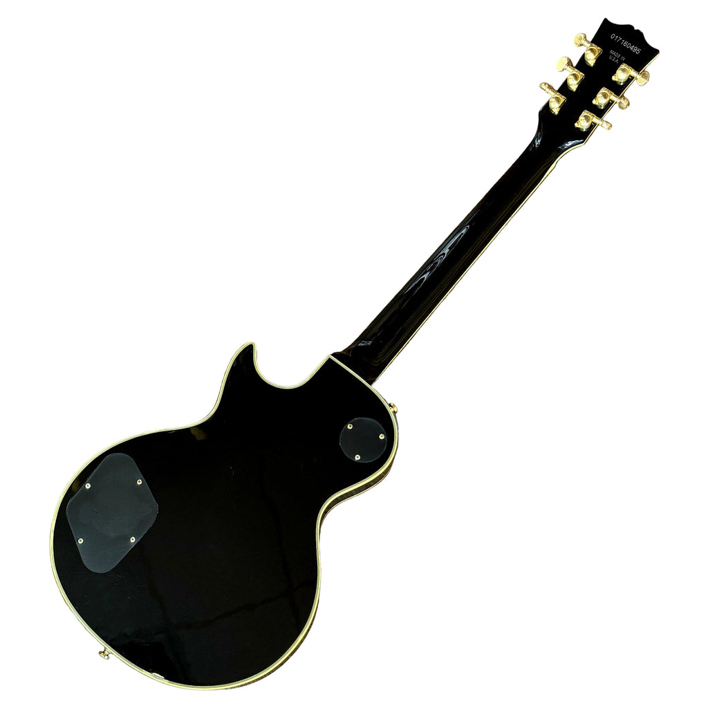 Gibson Les Paul Supreme Electric Guitar w/ Hard Case Black electric guitar on a wooden floor