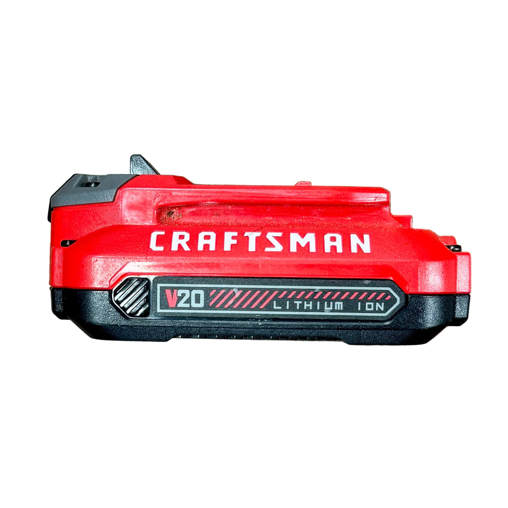 CRAFTSMAN V20 Cordless Handheld Vacuum w/ Battery (CMCVH001) Red Craftsman V20 lithium-ion battery on a wooden surface