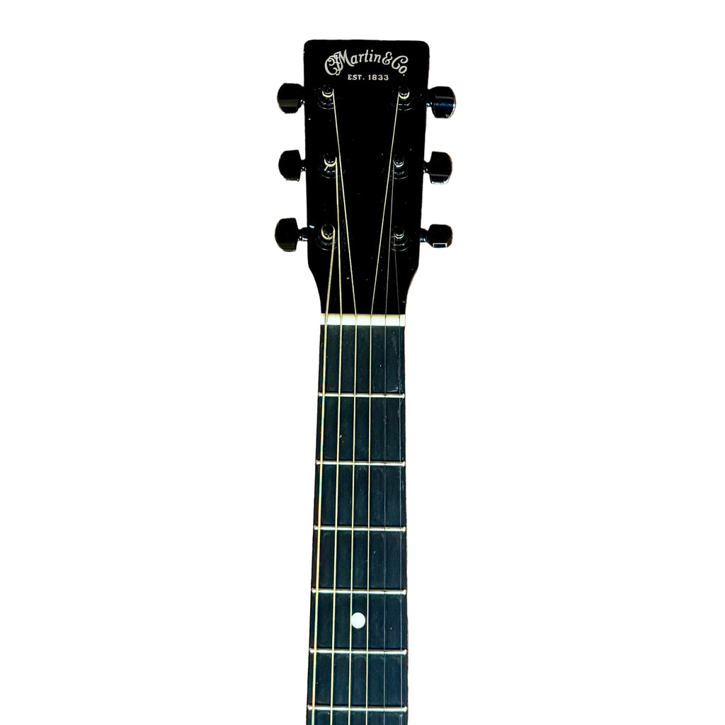 Martin Road Series 000-12E Acoustic-Electric Guitar w/ Soft Case Guitar headstock with Martin logo on a white background