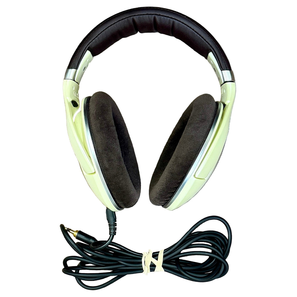 Sennheiser HD 599 Open-Back Over-Ear Audiophile Headphones - Ivory Headphones with a long cable on a white background