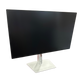 Black computer monitor on a white stand with a white background
