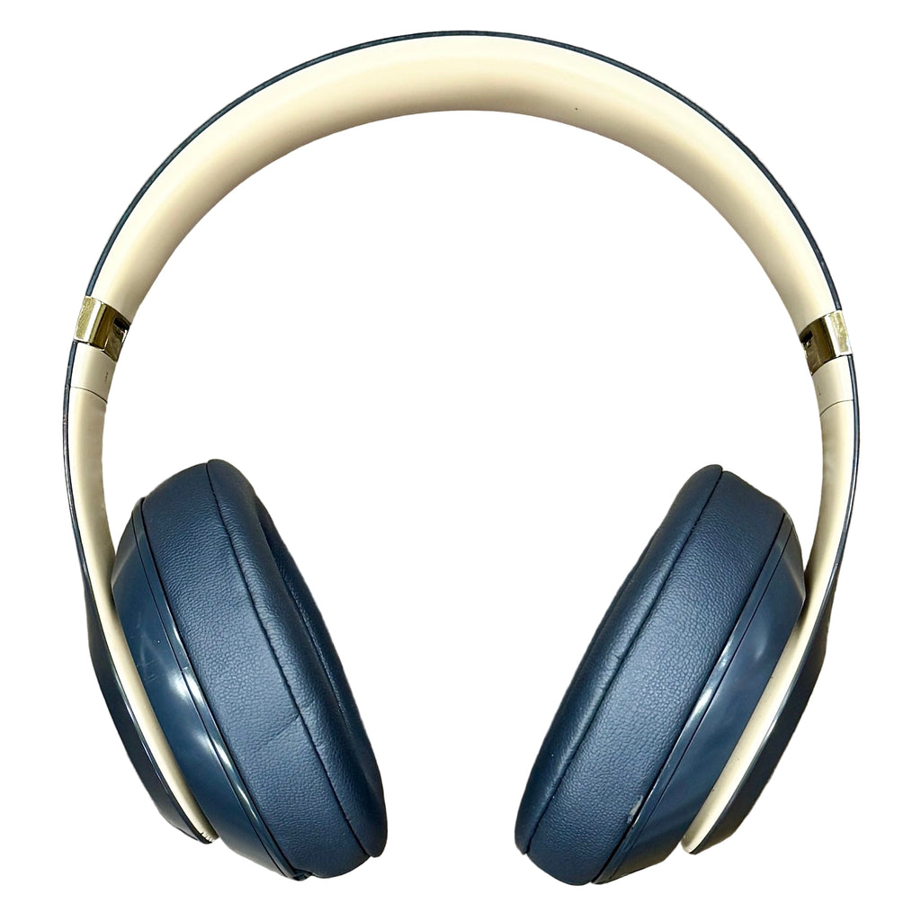 Apple Beats Studio3 Wireless Noise Cancelling Headphones - Shadow Gray Blue headphones with beige headband on a white background
