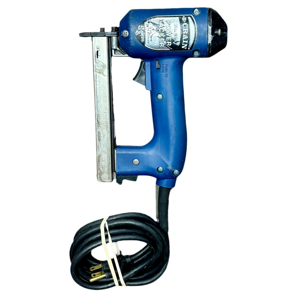CRAIN No. 625 POWER TACKER 11-Amp Corded Carpet Tacker w/ Hard Case Blue nail gun with a coiled cable on a white background