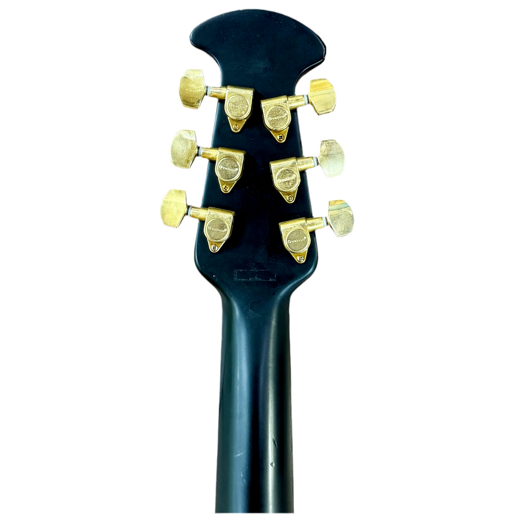 Ovation Celebrity CC24 Acoustic-Electric Guitar Close-up of a guitar headstock with tuning pegs on a white background