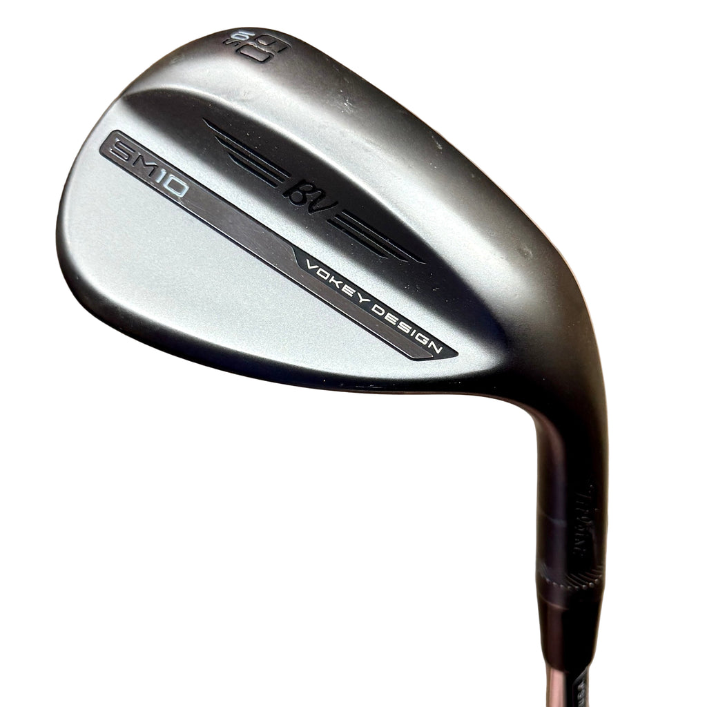 Titleist VOKEY DESIGN SM10 60-Degree Wedge RH Golf Club Golf club head with 'SMD' and 'Volley Design' branding on a wooden floor background