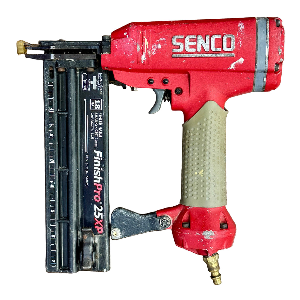 SENCO FinishPro 25XP 18-Gauge 2-1/8" Pneumatic Brad Nailer Red Senco nail gun on a wooden surface