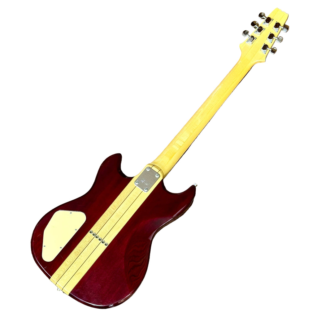 Aria Pro II Thor Sound TS-300 Electric Guitar w/ Hard Case Electric guitar with a red body and yellow neck on a wooden floor.