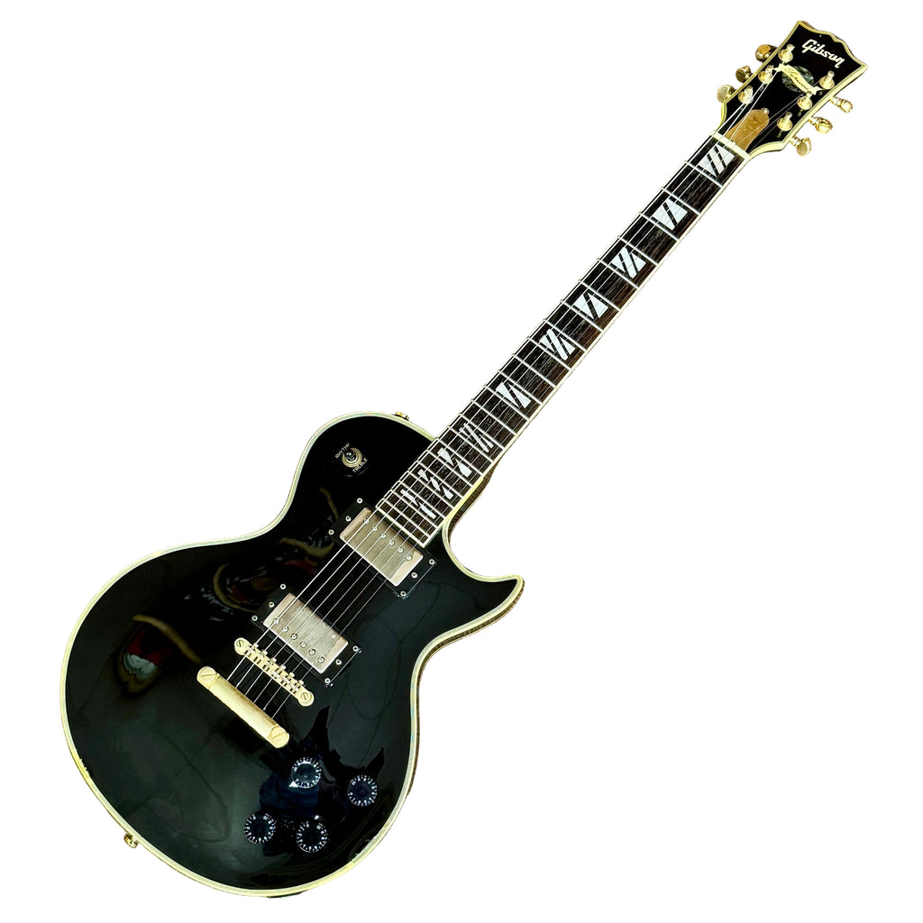 Gibson Les Paul Supreme Electric Guitar w/ Hard Case Black electric guitar on a wooden floor
