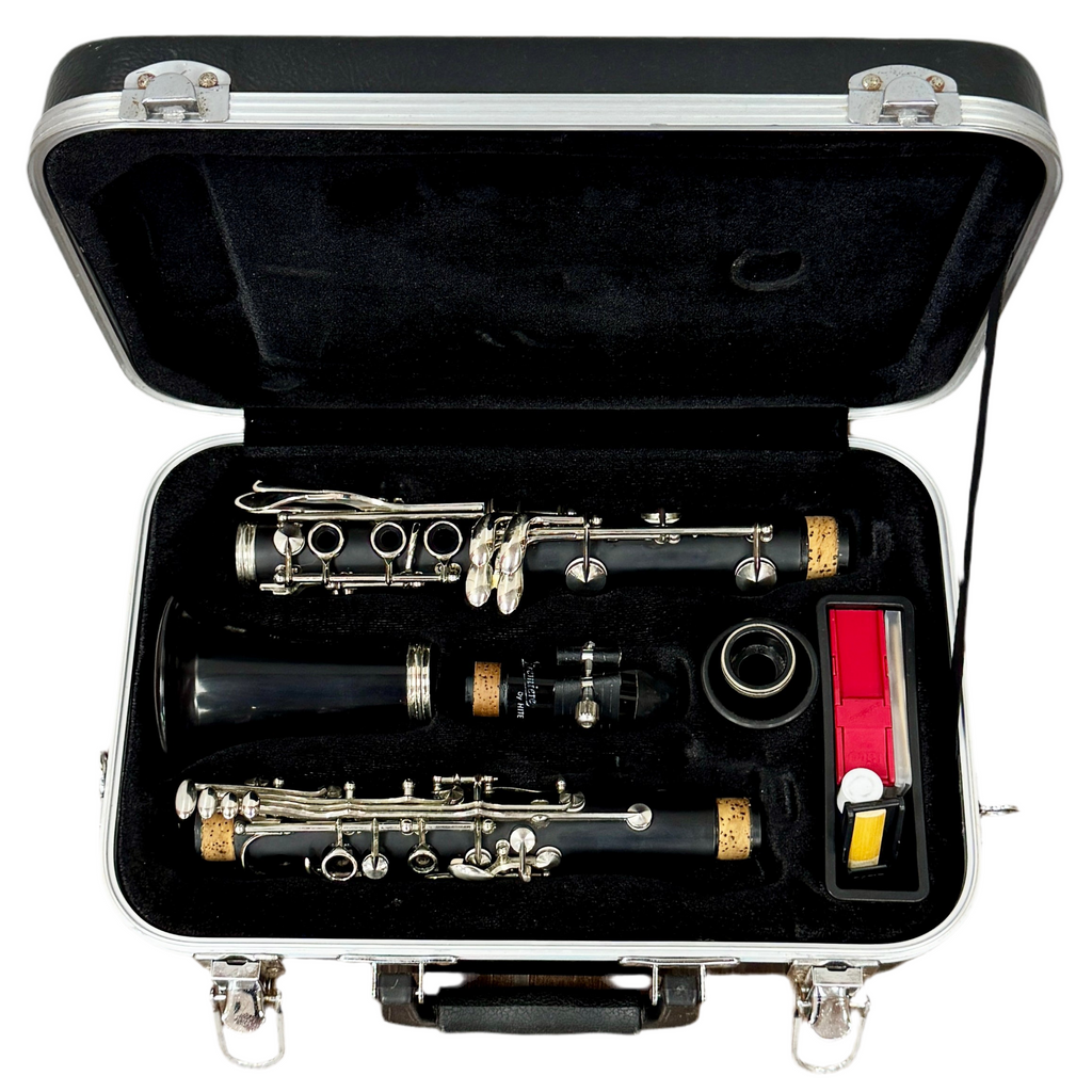 Buffet Crampon Prodige Student Model Bb Clarinet w/ Hard Case Clarinet in a black case with silver and gold components on a white background