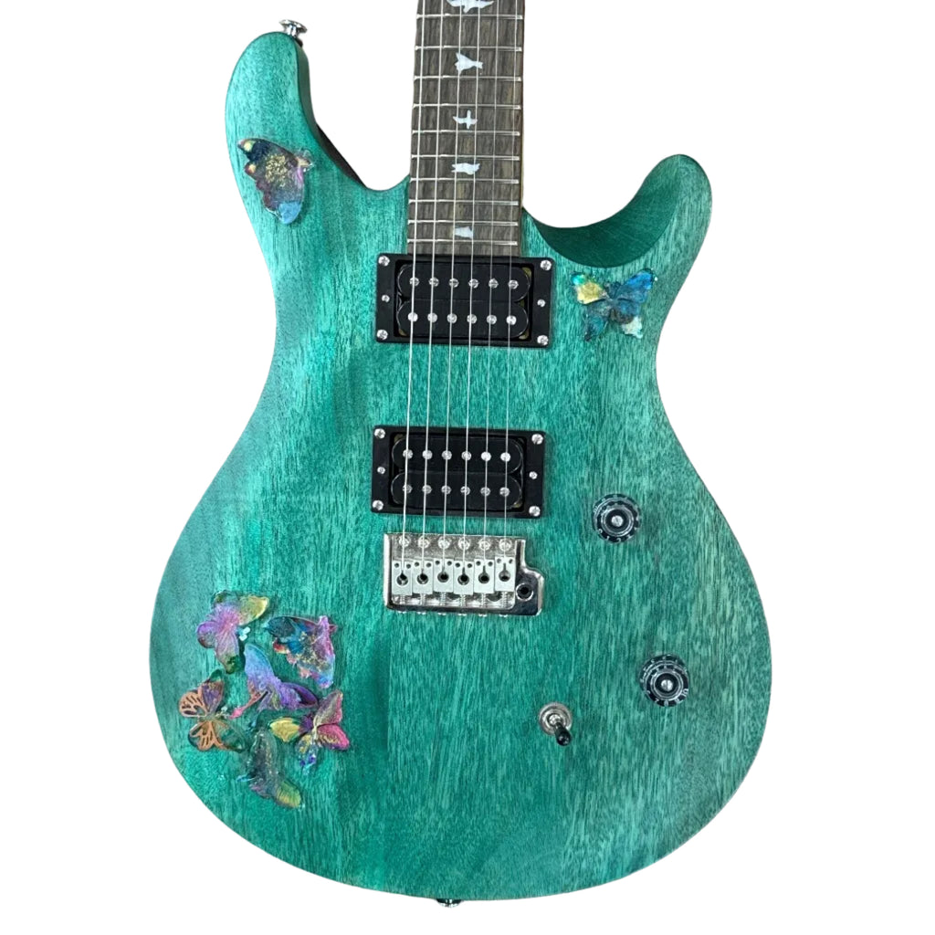 PRS Paul Reed Smith SE CE 24 Electric Guitar Green electric guitar with floral designs on a wooden floor