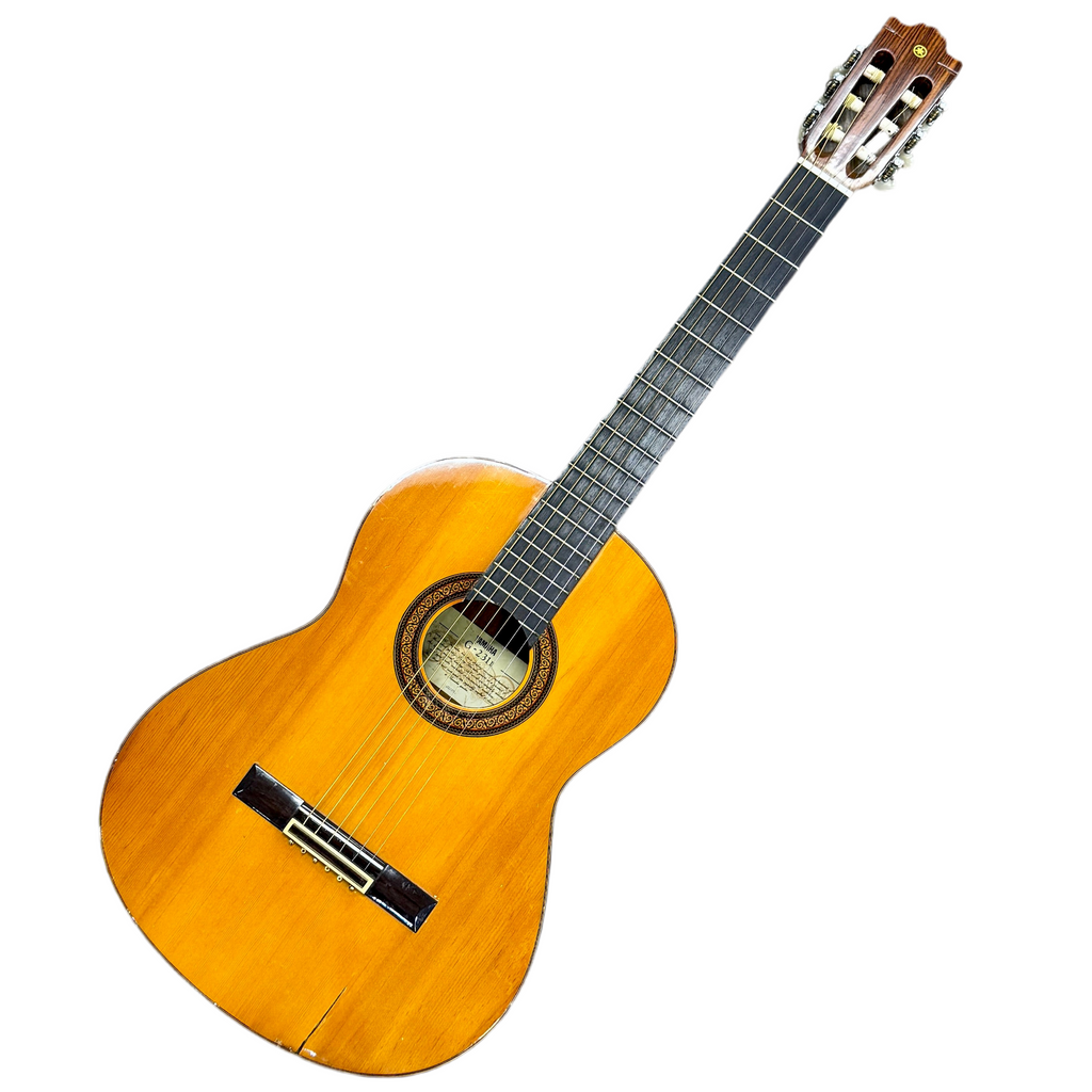Wooden Yamaha G-231 II classical guitar on a white background