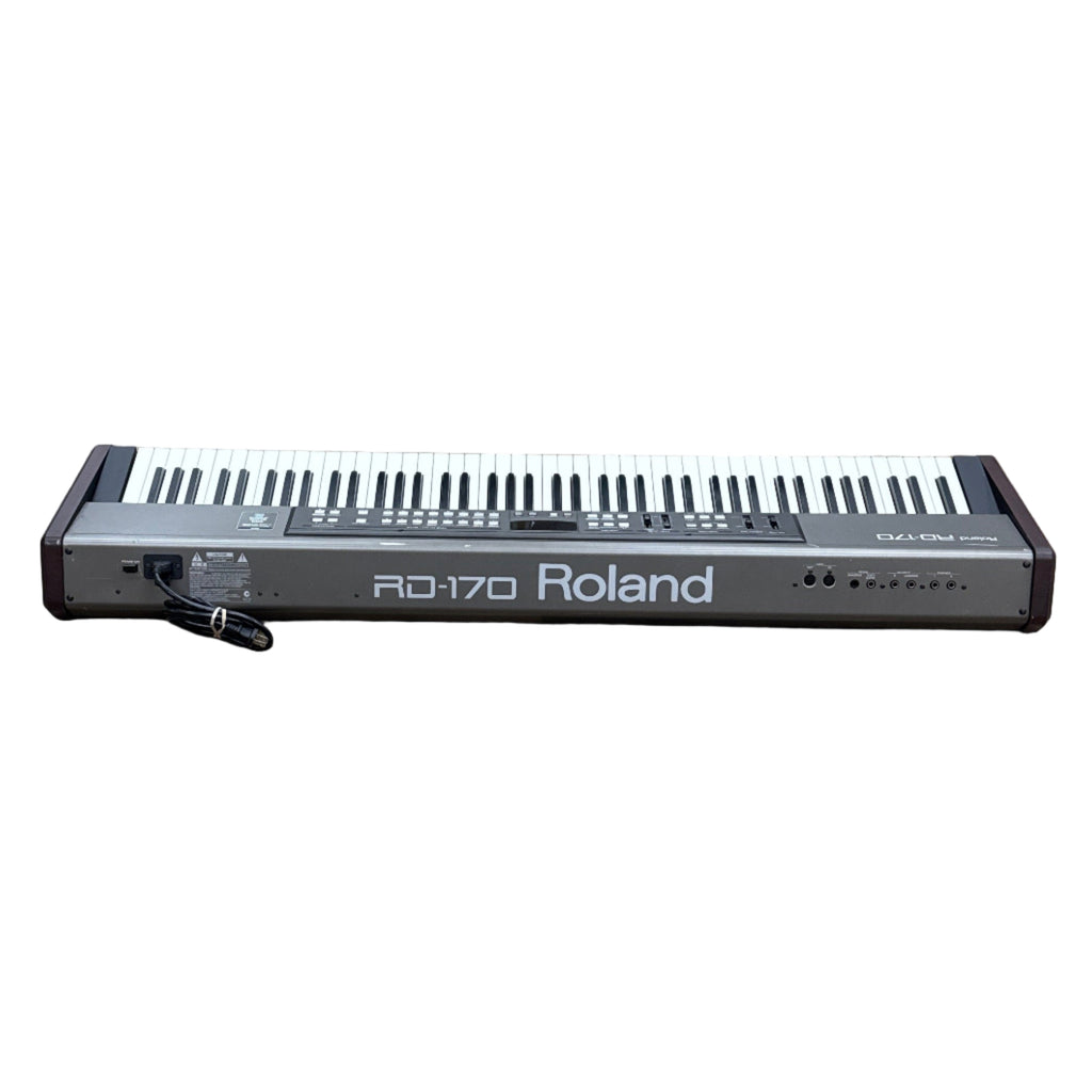 Roland RD-170 88-Key Digital Piano Roland keyboard on a wooden floor in a store setting