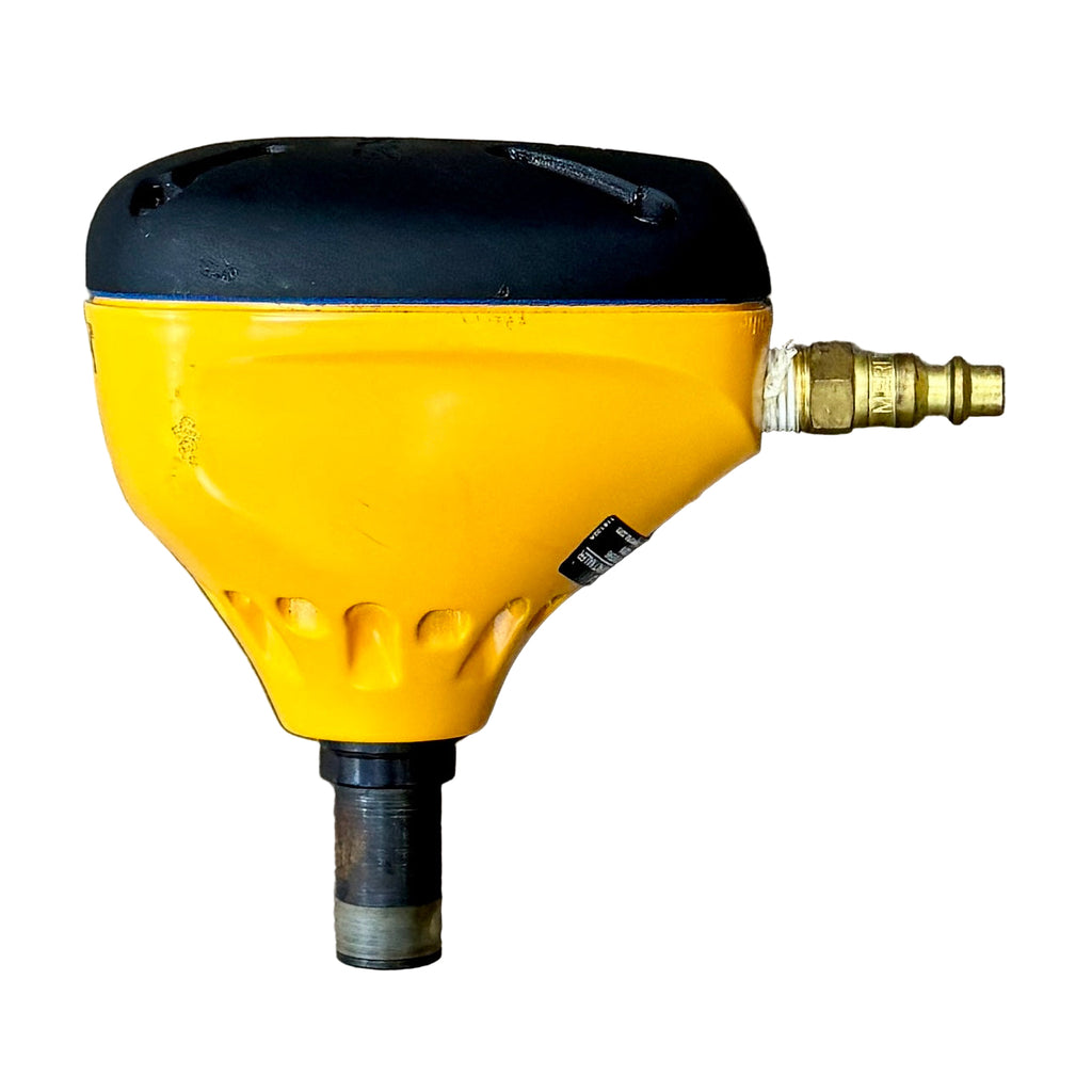 BOSTITCH Pneumatic Impact Palm Nailer w/ Hard Case (PN100) Yellow spray gun with black top on a wooden surface