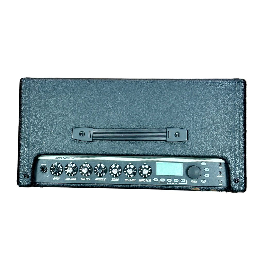 Fender MUSTANG III V.2 Modeling Guitar Combo Amplifier Black electronic device on a wooden floor with a person's feet visible