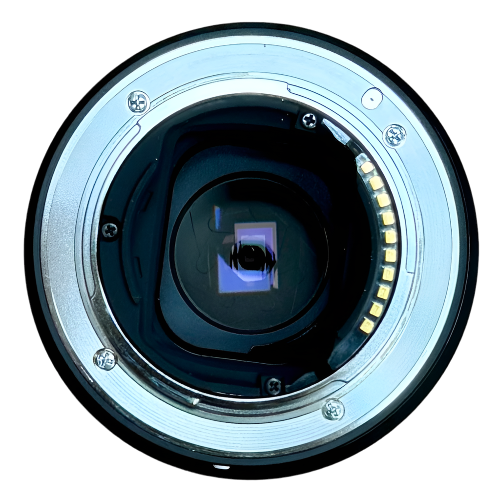 Sony FE 50mm f/1.8 Full-Frame Standard Prime Camera Lens w/ Hood & Caps (SEL50F18F) Close-up of a camera lens on a white background