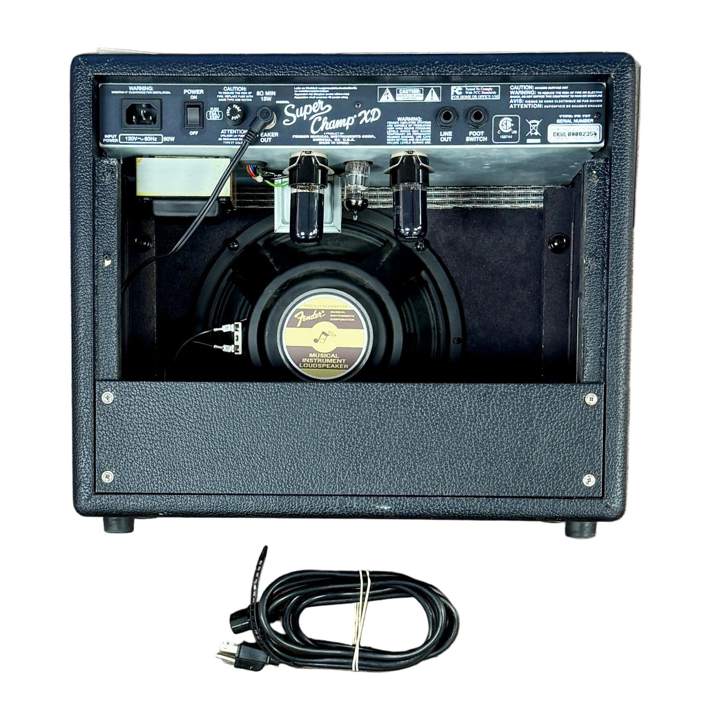 Fender Super Champ XD Guitar Combo Amplifier Small amplifier on a wooden floor with a person's feet wearing shoes.