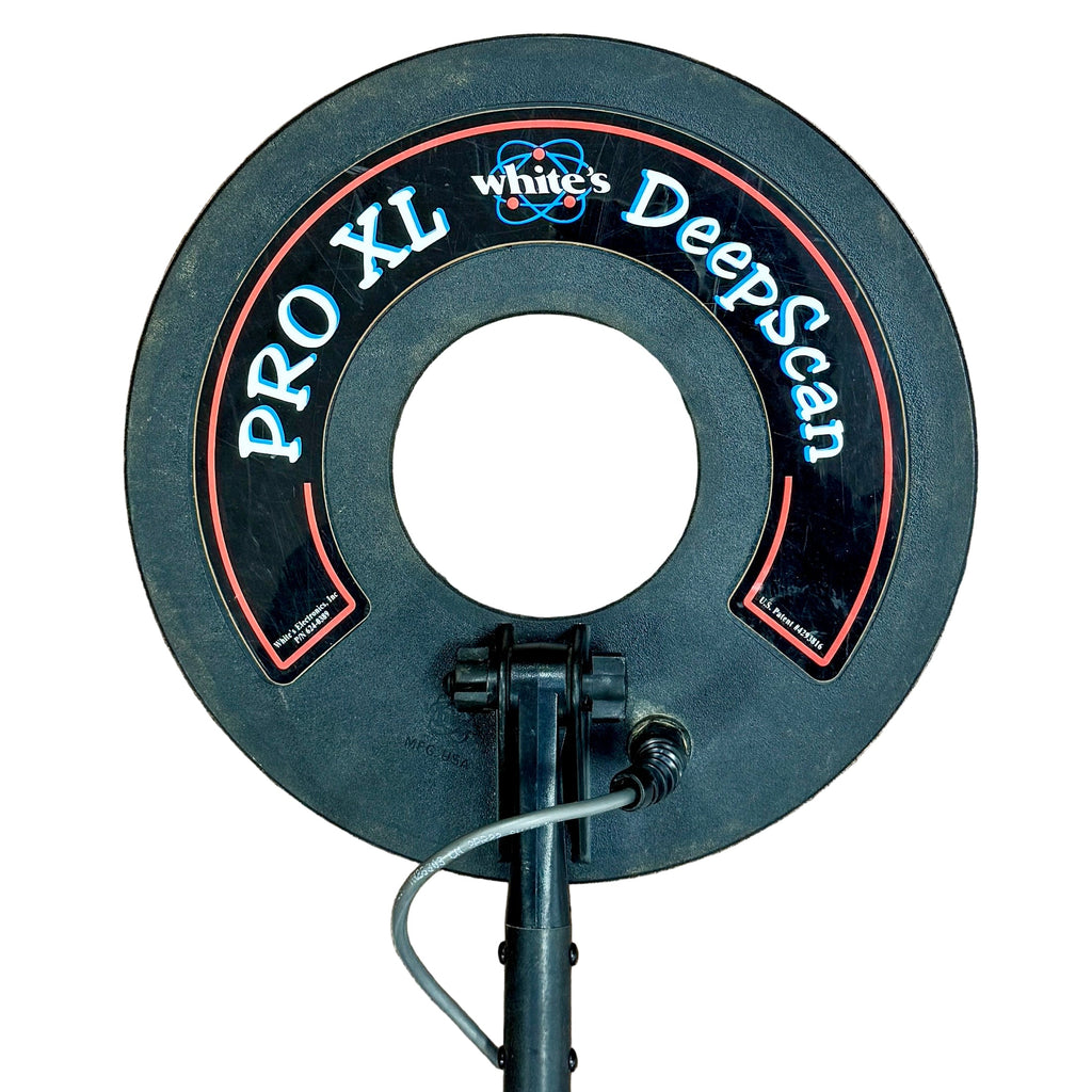 White's 6000 PRO XL Metal Detector Metal detector coil with 'White's' branding on a wooden floor.
