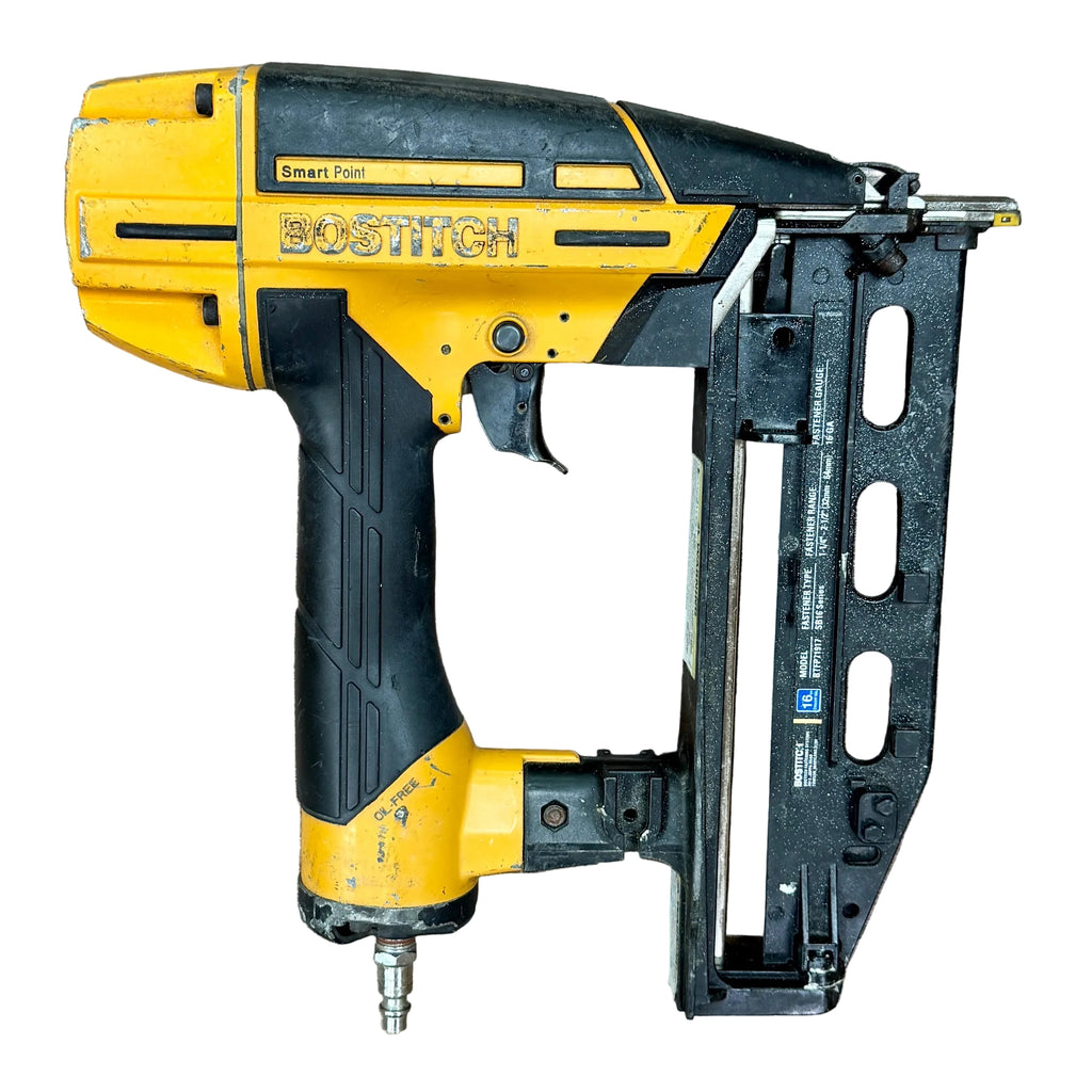 BOSTITCH Smart Point 16-Gauge 2-1/2" Pneumatic Straight Finish Nailer (BTFP71917) Bostitch nail gun on a wooden surface