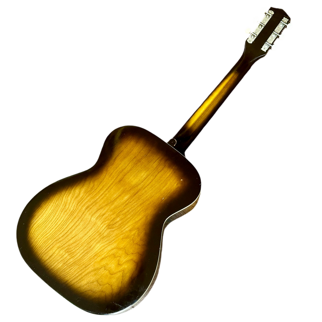 Acoustic guitar with a sunburst finish on a white background