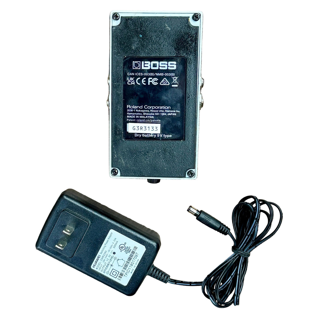 BOSS DD-3T Digital Delay Guitar Effects Pedal Boss power adapter with cable on a white background