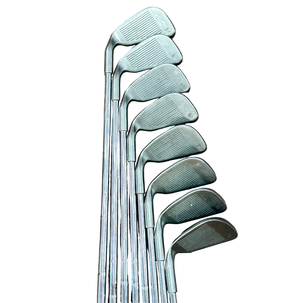 PING ZING Red Dot 8-Piece Iron Set RH Golf Clubs (3-7, 9, W, S) Set of golf clubs on a wooden floor