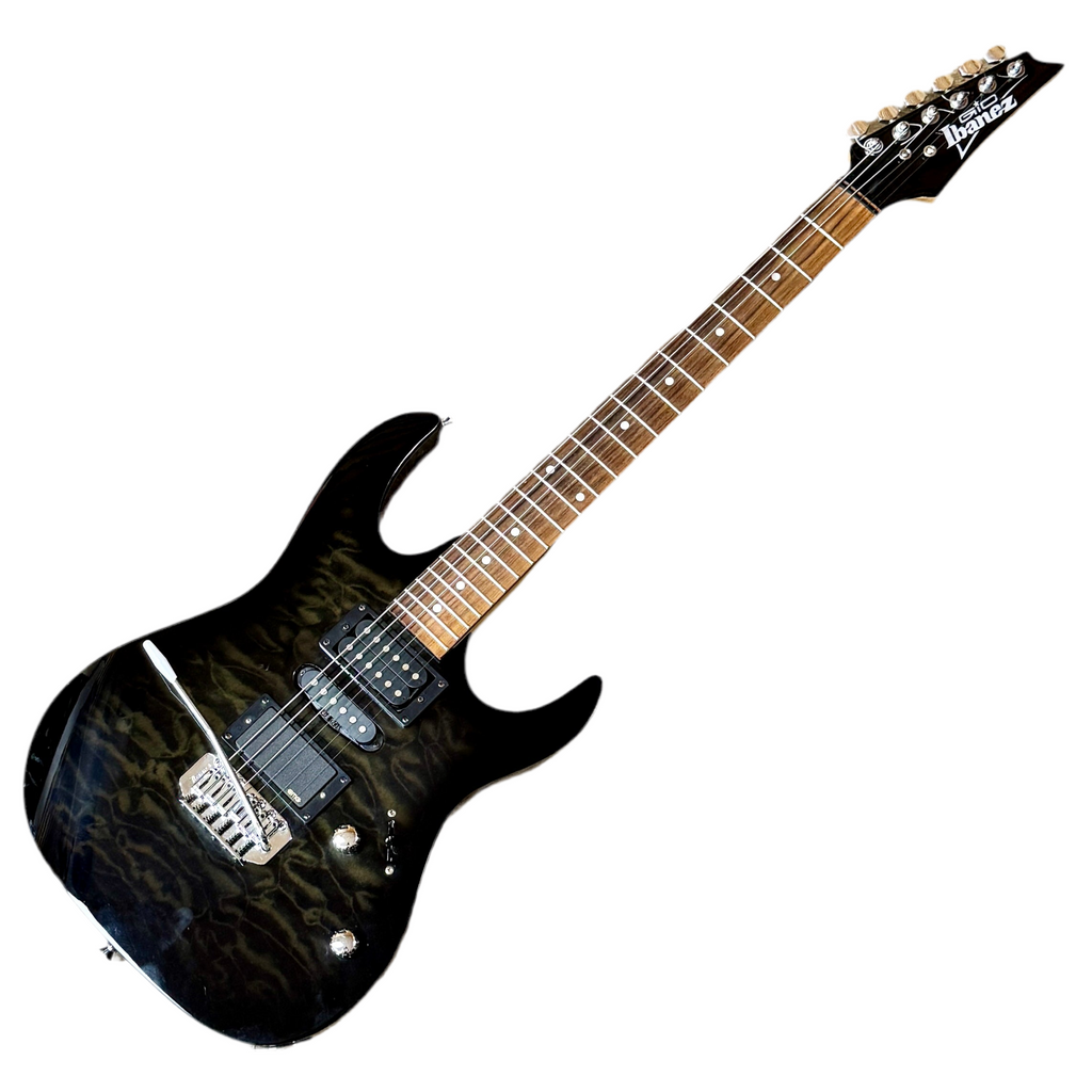 Ibanez GIO GS110700677 Electric Guitar Black electric guitar with a flame pattern on a white background