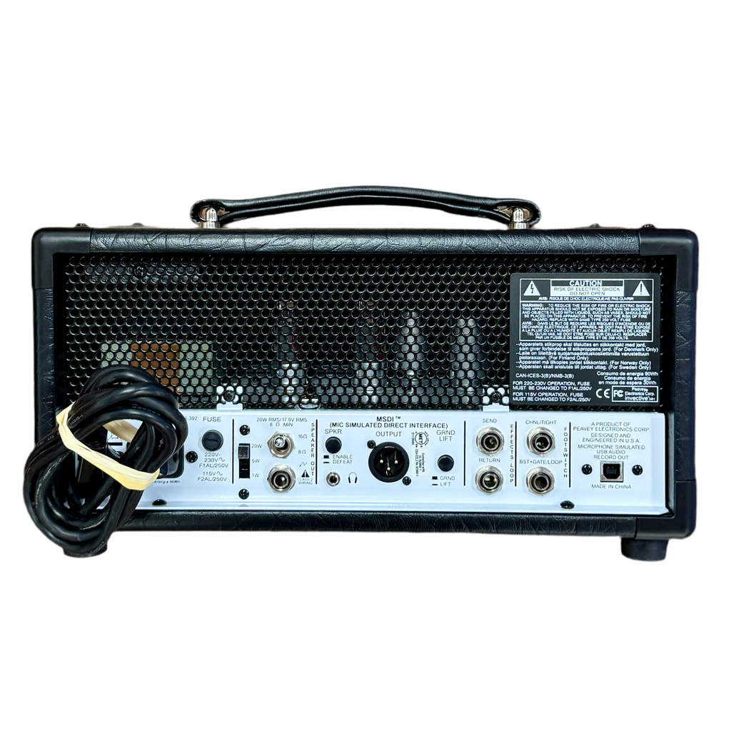 Peavey invective.MH Guitar Mini Amplifier Head Guitar amplifier head with control panel and cable on a white background