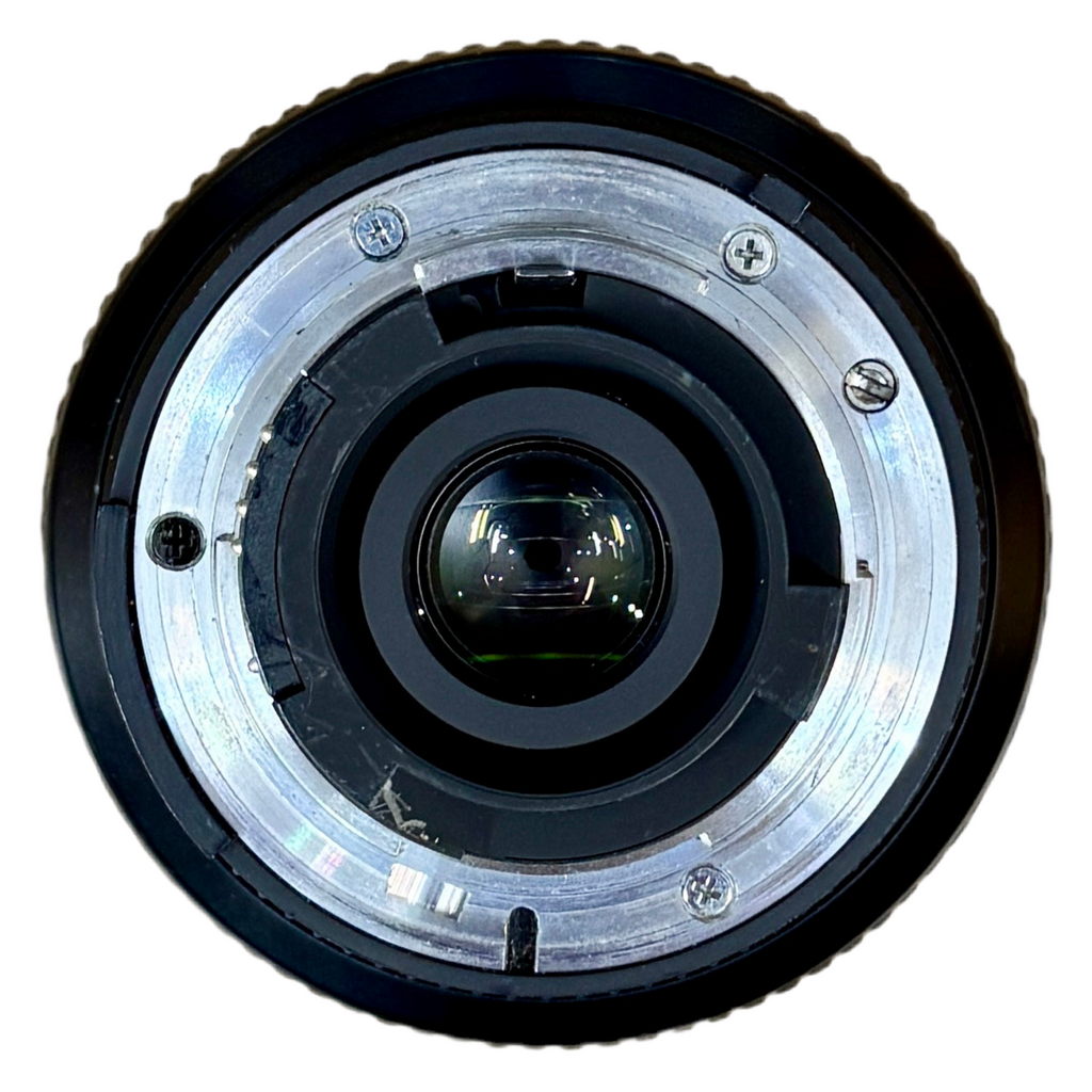 Nikon AF NIKKOR 24-120mm f/3.5-5.6D Camera Lens w/ Front & Rear Caps (F-Mount) Close-up of a camera lens on a white background