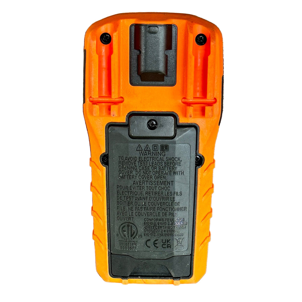 Klein Tools MM300 600V Manual-Ranging Digital Multimeter Back view of an orange and black device on a wooden surface