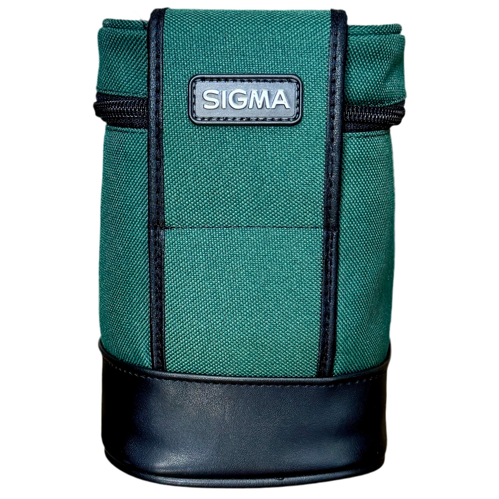 SIGMA 70-300mm f/4-5.6 APO Camera Lens w/ Caps & Case (Canon AF) Teal and black Sigma bag on a white background